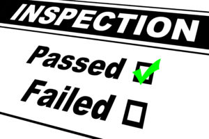 Inspection report results filled out with Passed chosen isolated on white